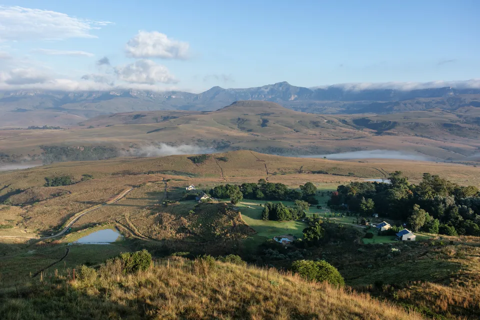 Farmland and foothills below the berg
