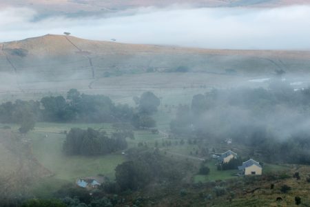 Open mountain grasslands and natural landscape at Berghouse and Cottages